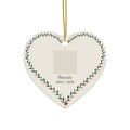 Heart-shaped ceramic pet memorial ornament with a personalized pet photo, name and dates inside a leafy vine border